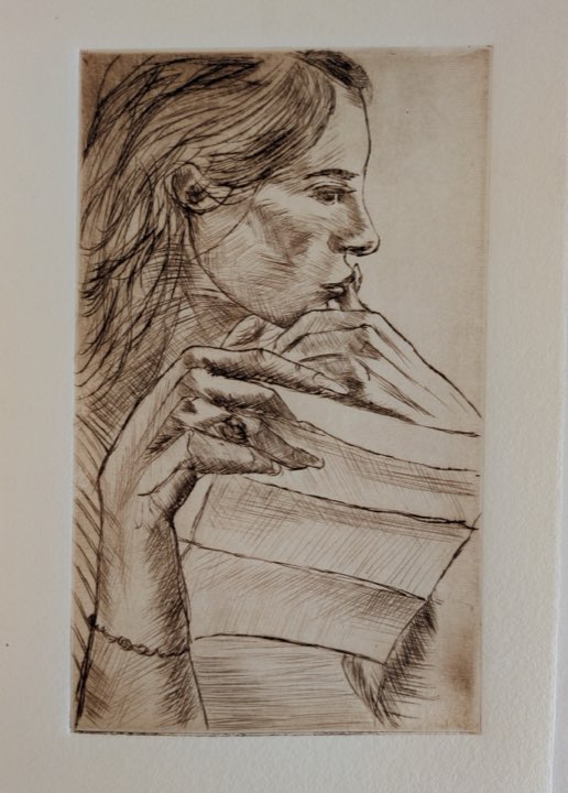 La lettre, profil d’une femme qui lit, la main au menton